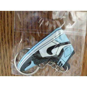 new 2 mini Nike shoe key chains and one (1) mini teal blue shoe key chain